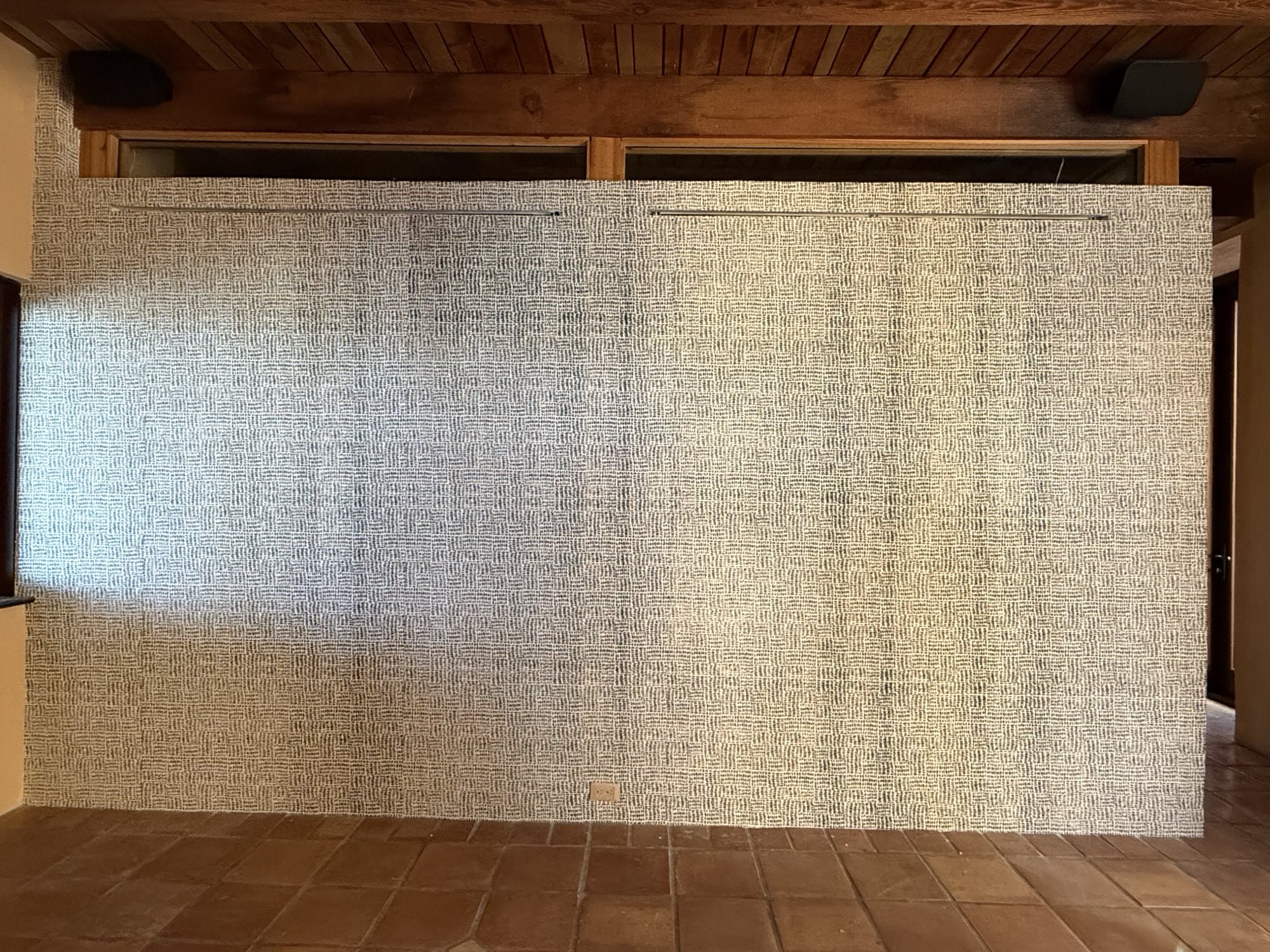 Finished wallpaper accent wall in a Palm Beach County home
